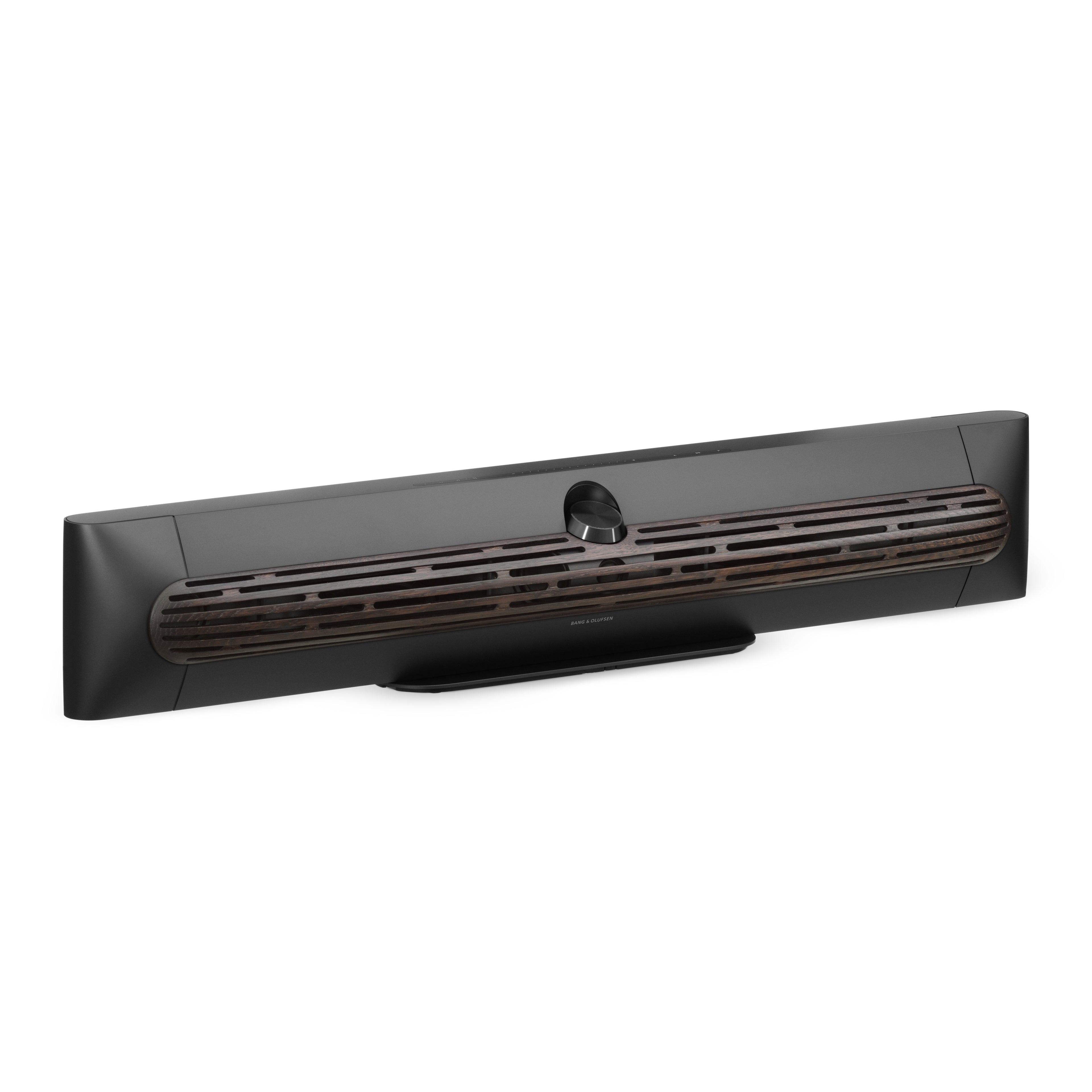 Bang & olufsen Beosound Premiere Soundbar in Black Anthracite mit Cover in Dark Oak Wood Ansicht von vorn auf den Standfuß