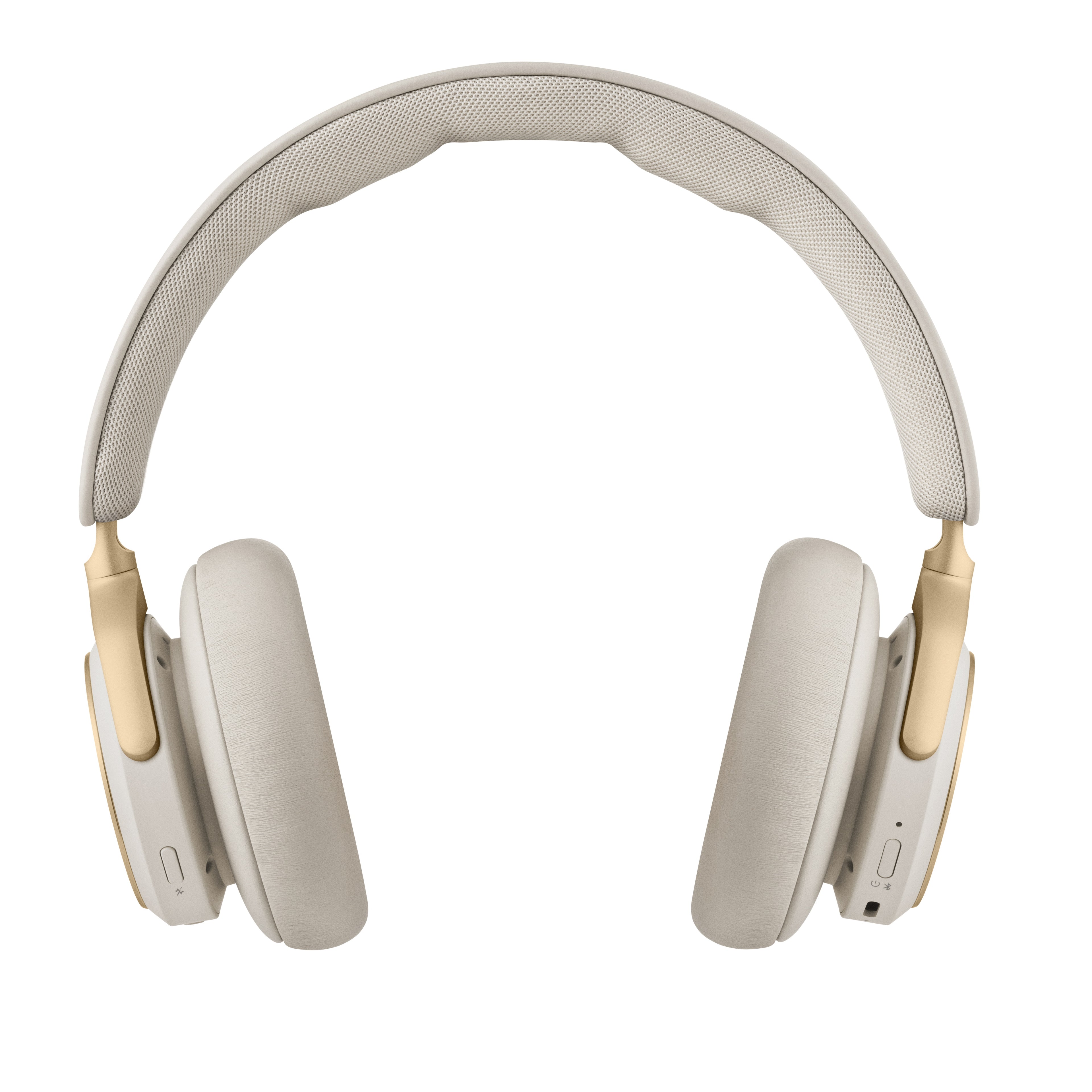Frontale Studio-Ansicht des Beoplay HX in Sand. Die Aufnahme zeigt die Bedienelemente an den Unterseiten der Ohrmuscheln, die goldenen Aluminium-Gelenke sowie den ergonomisch gepolsterten Kopfbügel aus Lammleder und Textil.